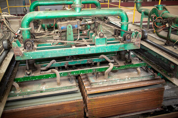 Fototapeta premium Slate factory, manufacturing technology.Modern equipment and machine tool automation. Technological works for the production of slate. Factory working atmosphere.