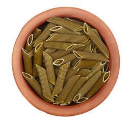 Organic green pea pasta, Penne rigate uncooked in clay pot isolated on white, top view 
