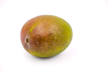 A red green sweet organic mango isolated with focus stacking against white in the studio