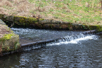 water flowing into the river