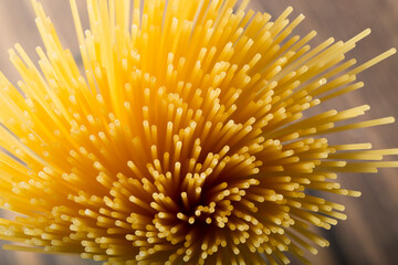 Pasta is long on a dark background.Italian cuisine.