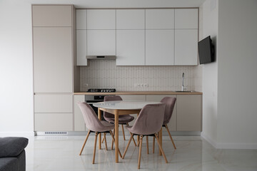 Modern Contemporary kitchen room interior .white and wood material. real new interior design