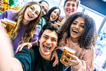 Multiracial friends drinking beer at brewery pub restaurant, Happy young people taking selfie picture indoor at bar on holiday-Lifestyle concept with guys and girls enjoying weekend 