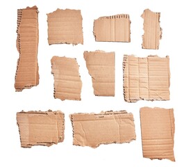  Ripped pieces of cardboard material over isolated white background