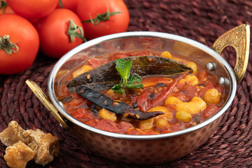 Bengali Style Sweet Sour And Spicy Tomato Chutney Also Called Tamatar Ki Khatti Meethi Chatney Or Chutni Bhoger Prasad Prepared Primarily From Fresh Tomatoes, Dry Fruits And Spiced With Garam Masala
