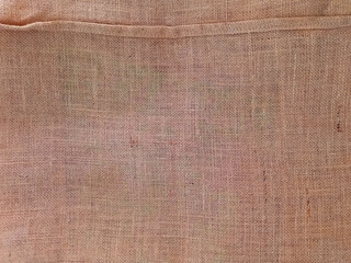 Fabric braided texture background. Rough beige and brown sack texture. Full frame of rough raffia....