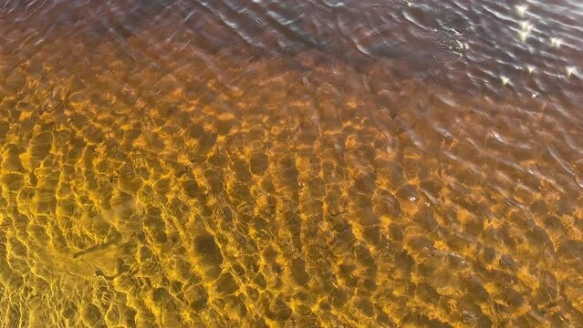 River orange yellow water containing iron compounds.