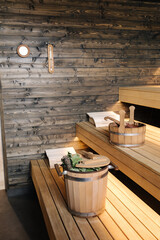 Interior of Finnish sauna. Front view of classic wooden sauna. Relax in hot sauna with dry steam