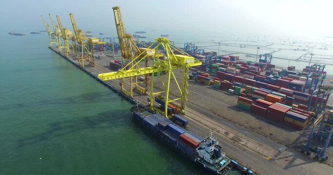 Container port Tanjung Emas Semarang with many containers  and Cranes in the morning. Container Terminal 