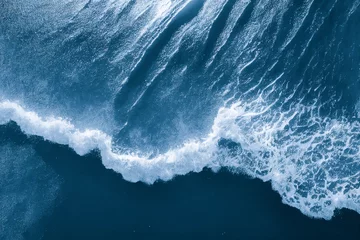 Fotobehang Spectacular aerial top view background photo of ocean sea water white wave splashing in the deep sea. Drone photo backdrop of sea wave in bird eye waves. © Summit Art Creations