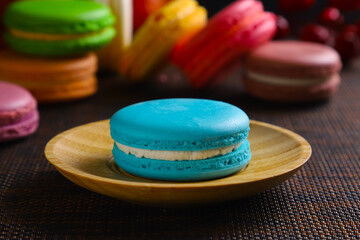 Colorful composition of different varieties of macoron cookies. Close-up