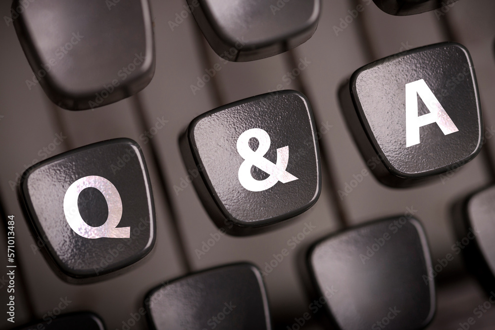 Fototapete q and a concept. question and answer with buttons key on typewriter keypad.