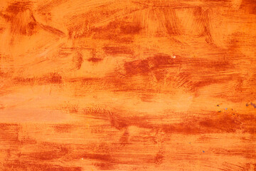Orande abstract painted metal plate texture and background. Texture of old plate with stained paint