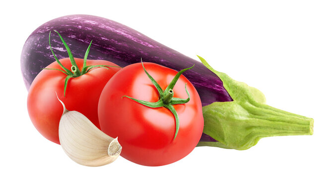 Raw eggplants, tomatoes and garlic cut out