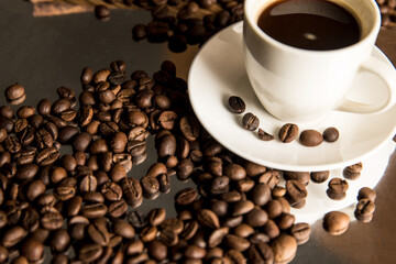 Cup of coffee and coffee beans