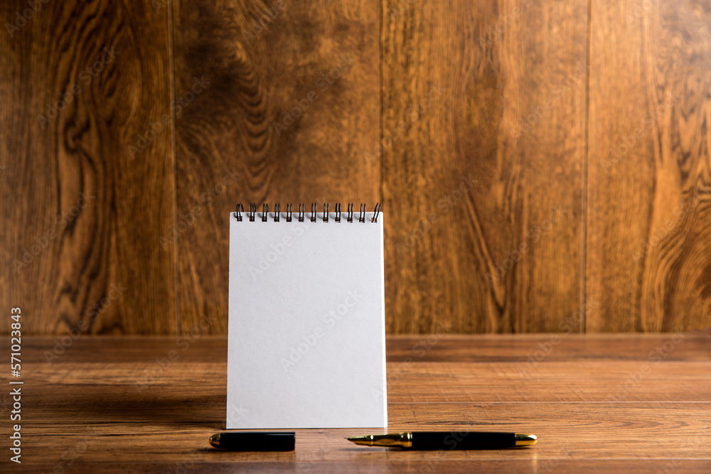 Poster blank notepad on the table