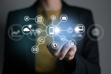 Woman pushing virtual screen with many social and functional icons of mobile apps. Multitasking in hands concept