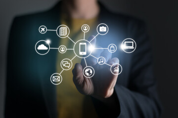 Woman pushing virtual screen with many social and functional icons of mobile apps. Multitasking in hands concept