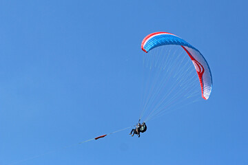 Tandem Paraglider being towed by a winch