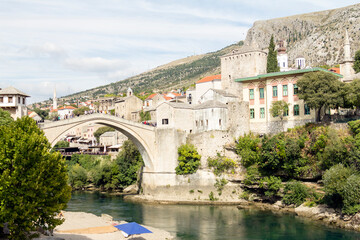 View of the old bridge in the city of Mostar and the Neretva river