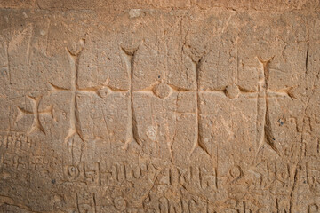 Ancient carvings on the facade of the Cathedral of the Holy Cross on Akdamar Island at Van lake in Turkey