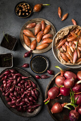 A beautiful still life of various varieties of onions, top view