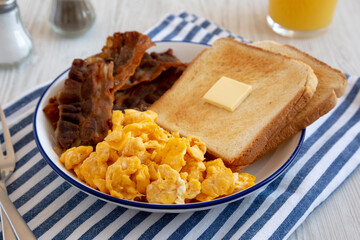 Homemade American Scrambled Egg Breakfast on a Plate, side view.