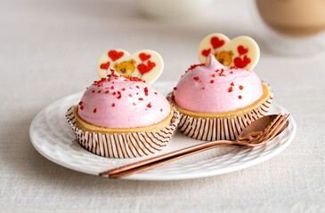 Delicious caramel Valentine's Day Cupcakes With Heart Shape and raspberry taste