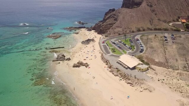 Calheta golden beach in Porto Santo Island - Drone top view of transparent and turquoise sea