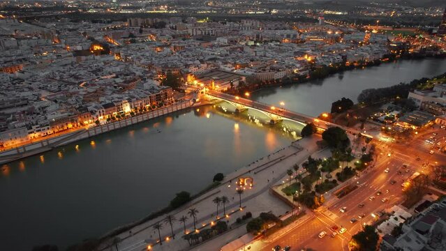 Aerial view of the Seville cityscape at night, Andalusia region, Spain.