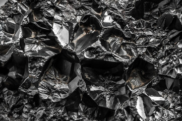 hematite macro detail texture background. close-up raw rough unpolished semi-precious gemstone