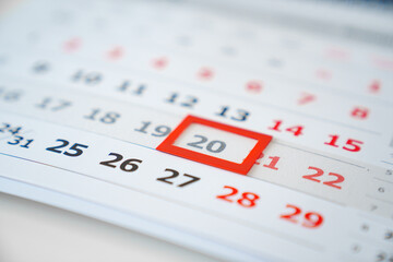 the red tab on the flip calendar page. 