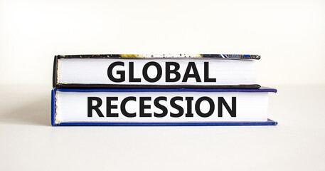 Global recession symbol. Concept words Global recession on books. Beautiful white table white background. Business and global recession concept. Copy space.