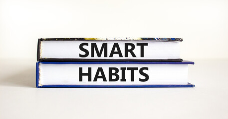 Smart habits symbol. Concept words Smart habits on books. Beautiful white table white background. Business and smart habits concept. Copy space.