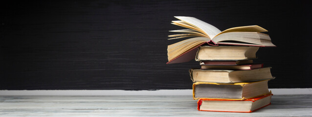 Vintage old hardback books. Education background. Back to school. Copy Space.