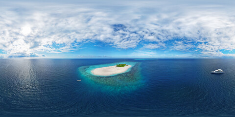 Aerial spherical panorama of a tropical paradise beach on the tiny island of Maldives. Turquoise ocean and white sand. Aerial seamless spherical 360 degree panorama