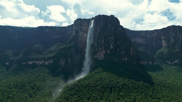 Aerial view of amazing Angel Falls. A huge flow of water falls from the mountain. The tallest uninterrupted waterfall in the world. Canaima National Park, Venezuela