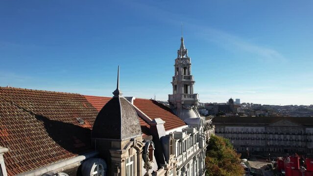 Aerial drone view of Porto city center, typical tile red roofs and houses at sunny day, Portugal