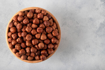View of a bowl full of hazelnuts,top view