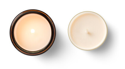 two isolated candles: burning soy way candle in an amber glass jar and a cream colored tea light, decorative lifestyle design elements over transparent background, top view / flat lay - 571057631