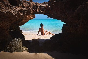 Sunbath beach framed rock australia paradise place