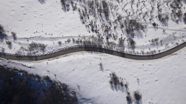 Old Mountain Balkan Stara Planina Babin Zub tourist resort in winter day covered with snow empty road