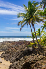 Sand, waves and rocks at Havaizinho beach