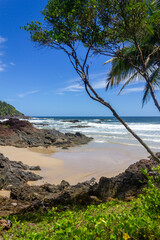 Sand, waves and rocks at Havaizinho beach