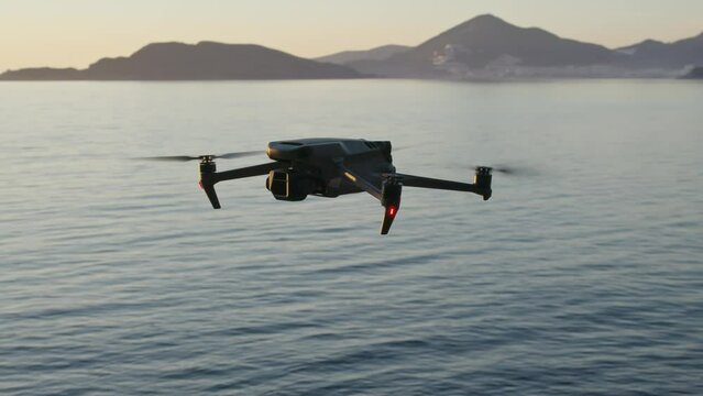 Montenegro, january 2023: drone with a camera dji mavic 3 fly over the sea at sunset