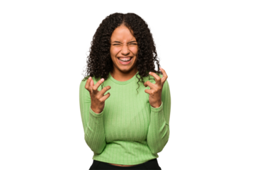 Young african american curly woman isolated upset screaming with tense hands.