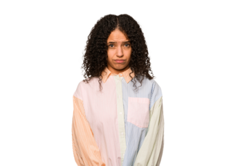 Young african american curly woman isolated sad, serious face, feeling miserable and displeased.