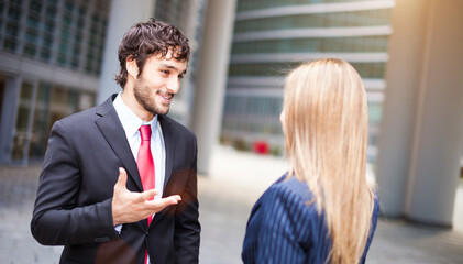 Two business partners discussing outdoor