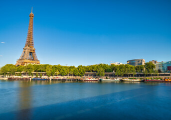 Fototapeta na wymiar Riverside view of Eiffel Tower in Paris. France