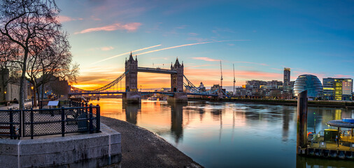 Tower Bridge panorama at sunrise in London. England